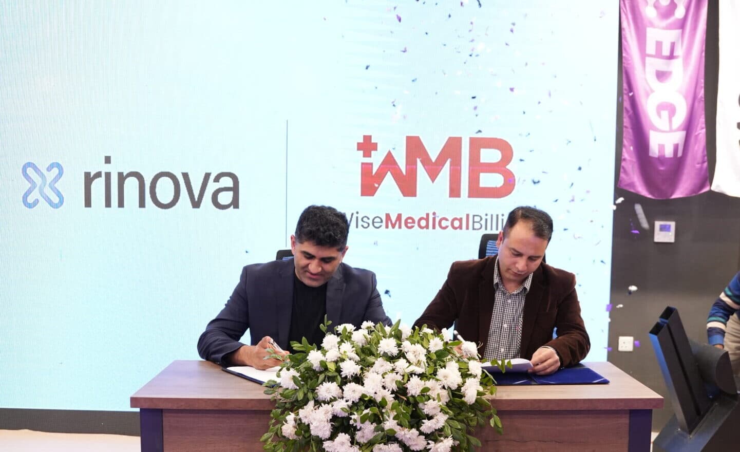 Rinova AI and Wise Medical Billing representatives sign the partnership agreement